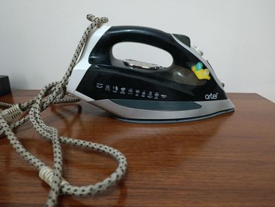 Паровой утюг Artel
