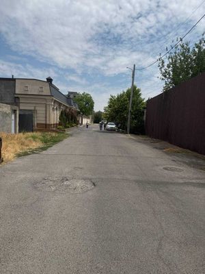 Продаётся участок Мирзо Улугбекский район ул Укитувчи 12соток Фасад20м