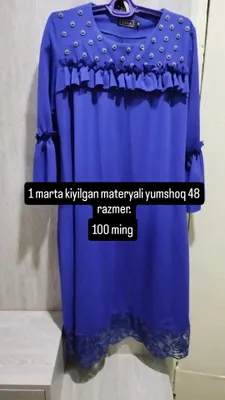 ko'ylak tizzadan pastda turadi