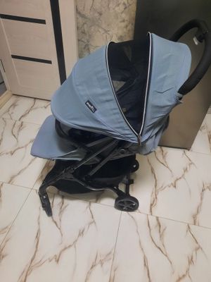 Продаётся фирменный коляска Evenflo