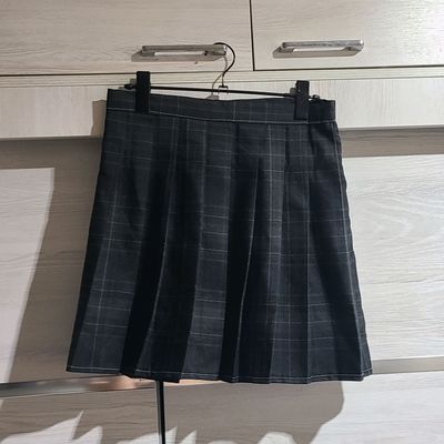 черная юбка в клеточку