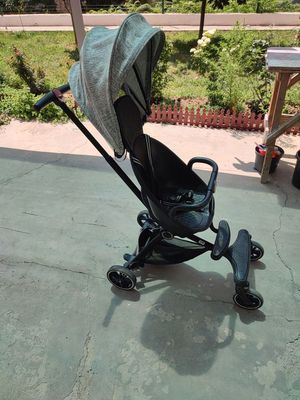 Детская прогулочная коляска