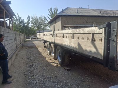 Прицеп бортли сотилади