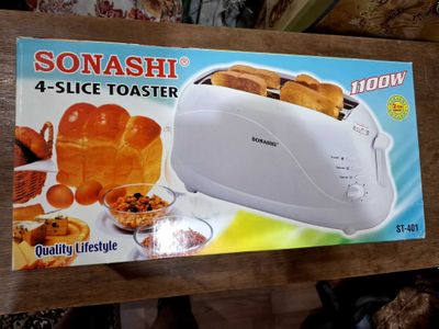 Продам тостер sonashi 1100w