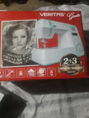 tikuv mashinasi hali ochilmagan yangi ishlatilmaga