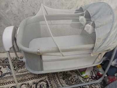 Muzikali tebranadigan bolalar belanchagi