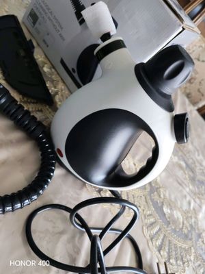HANDHELD STEAM CLEANER