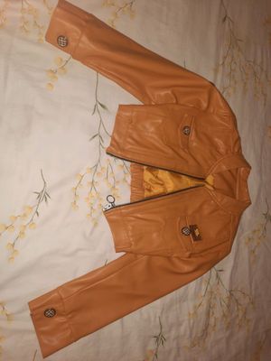 1 martta kiyilgan 10-12 yoshga, materiali "кожа"