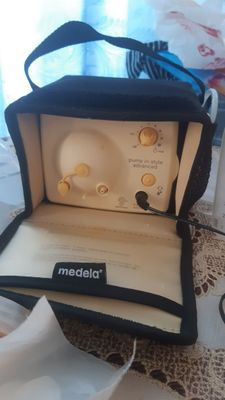 Электрический молокоотсос medela