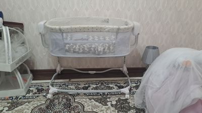 Люлька становится и манеже