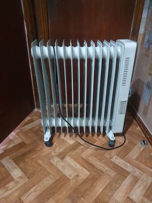 Масляный обогреватель