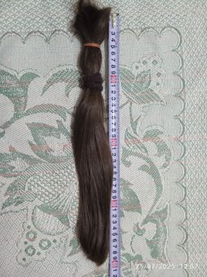 Kesilgan 40cm 78gr soch bor 10 yil oʻstirligan 14- yoshli qizniki