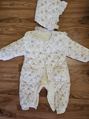 Продам очень красивый детский комбинезон