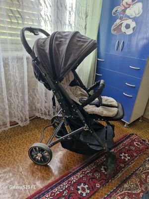 Каляска сотилади холати яхши ичидаги курпачаси бн