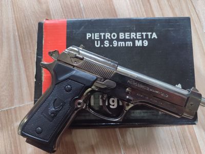 Зажигалка пистолет.