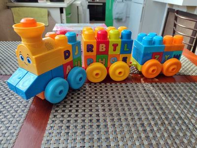 игрушка FISHER PRICE Музыкальный поезд-алфавит