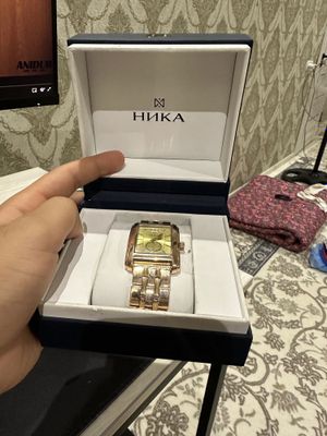 Nika золотые часы