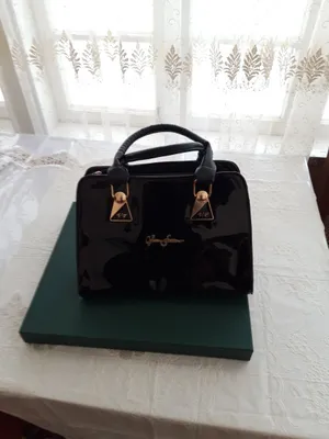 Женская сумка кожанная перламутровая черного цвета