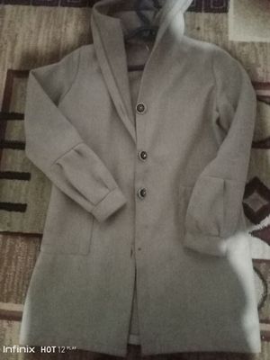 kiyilgan kalta kardigan xolati yangi