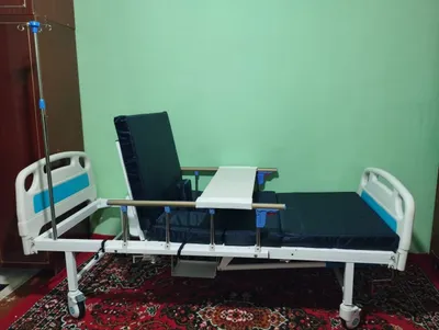 Кровать с функцией подъемама для лежачих.