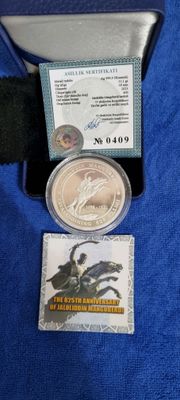 Серебряная монета Узбекистана