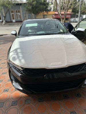 kia k5 2023 yil salondan 2024 olib minilgan