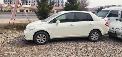 Nissan tiida 2008 yil 232000 km 7000 $