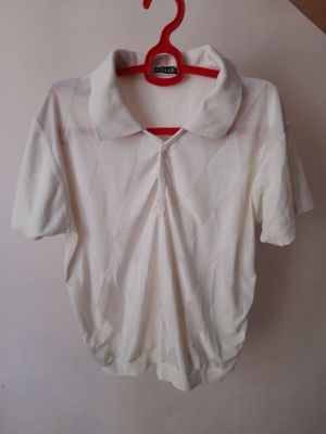 futbolka,  razmer L , qaymoq rang 25.000