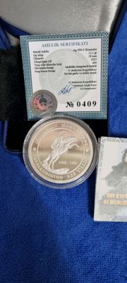 Серебряная монета Узбекистана