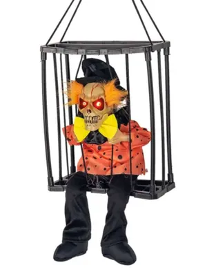 Игрушка монстр в клетке