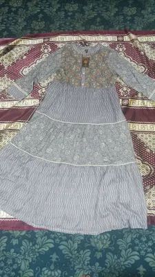 koʻylak yangi bir marotaba ham kiyilmagan holati.