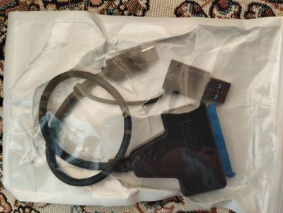 SATA adapter tape-C ва USB га чиқаради