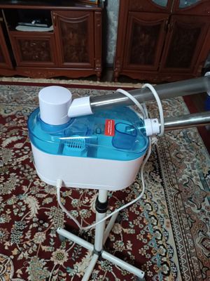 Salon jihozlari, par purkaydigan aparat bilan stul