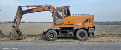 Экскаватор амкадор 1400 сотилади ишлаши зур