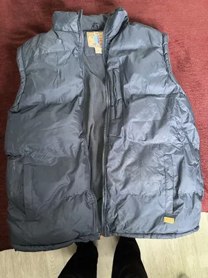 Теплая жилетка на зиму