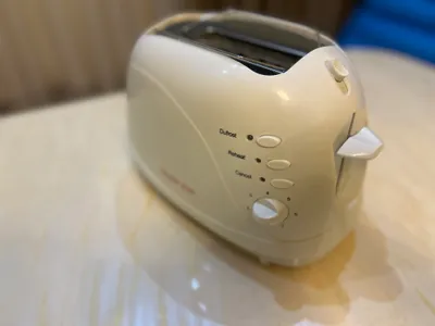 Toster olip ishlatilinmagan ideal holata.