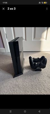 PlayStation 4 1TB SSD 2 kontrollerlari Zaryadlovchi dock vertikal sten