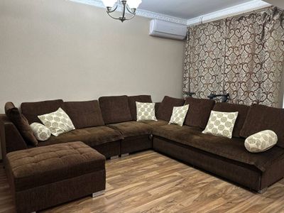 Диван с раскладным механизмом и отделом для хранения белья, игрушек