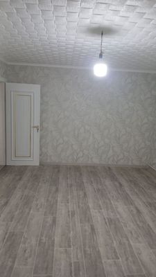 Квартира с ремонтом. Первый этаж. ЯНГИЮЛЬ ул. Беруни. Кирпич 60 м².
