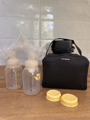 Молокоотсос Medela автоматический