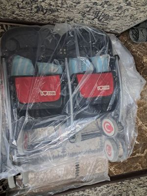 Детская коляска для двойняшек