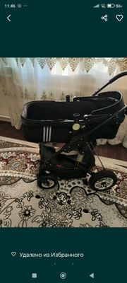 Коляска черная