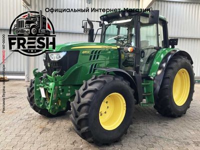 Колесный трактор John Deere 6115M