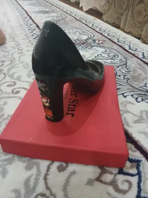 Tufli ayollar oyoq kiyimi