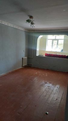 Продаётся кирпичный дом в центре Олмалика!