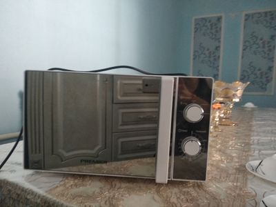 Mikrotolqinli pech srochna sotiladi narxi 2.ml iwlatilmagan