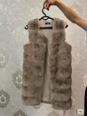 Безрукавка женские