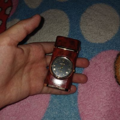 Часы зажигалка .