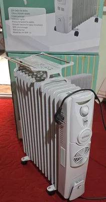 Масляной обогреватель.