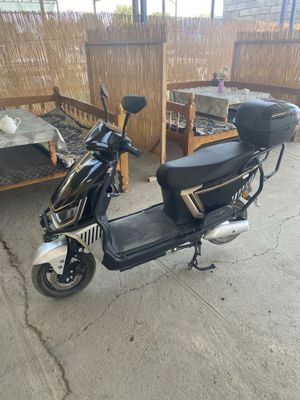 Skuter E bike zaryadkali